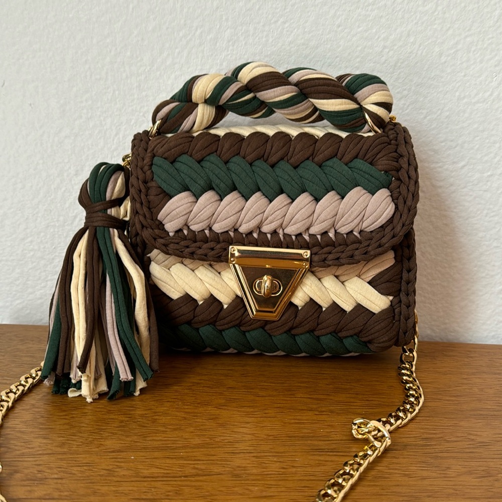 Crochet Bag with gold chain shoulder strap.